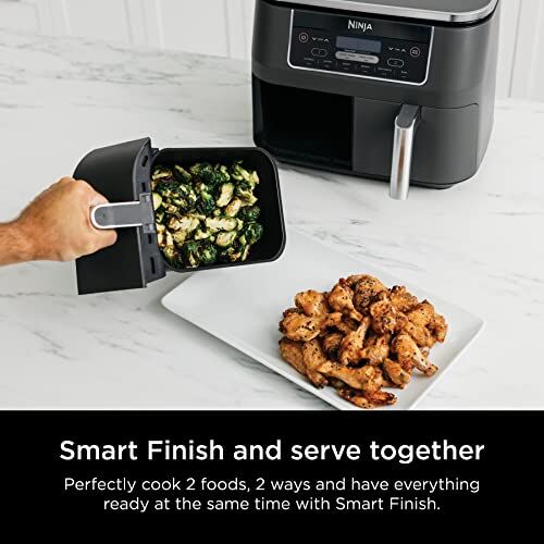 A Photo of dual-zone technology https://articleblogging.com/wp-content/uploads/2023/08/Ninja-DZ201-Foodi-Air-Fryer-air-fryer-kitchen-appliance-dual-zone-technology-versatile-cooking-rapid-cooking-easy-to-use-control-panel-customer-reviews-Kitchen-Appliances-d75f9a9e.jpg